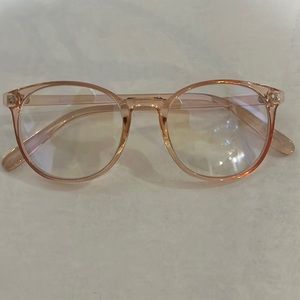 Women’s blue light glasses. Very pale pink.